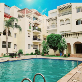 Fes Urban Apartment - Urban Elegance with Garden and Pool Access